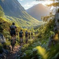 Mountain Trail Adventure Cyclists Overcoming Rocky Terrain, Enjoying Scenic Highland Views photo