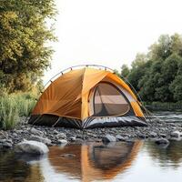Scenic Camping Spot with Tent Near Water, Isolated White Backdrop photo