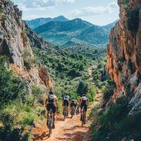 Sunny Day Cyclists Overcoming Tough Terrain, Surrounded by Majestic Highland Scenery photo