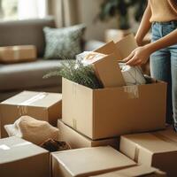 Organized Moving Process With Boxes And Belongings In Sunlit Room photo