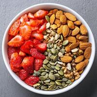 Bowl of Almonds, Dried Strawberries, Seeds, and Mixed Nuts photo