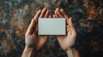 Closeup of hands with empty card, high resolution detail photo