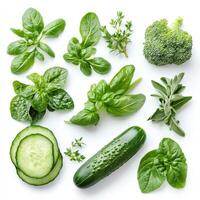 Assorted Green Vegetables and Herbs Arranged on a White Background photo