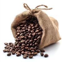 Spilled Coffee Beans on Wooden Table with Natural Textures photo