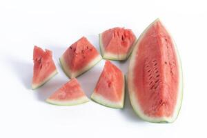 Slices of fresh red watermelon on white background, top view photo
