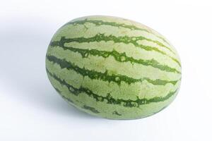 Fresh whole watermelon on white background, highlighting natural summer fruits, closeup photo
