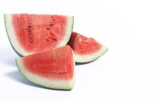 Fresh slices of juicy watermelon on a white background photo