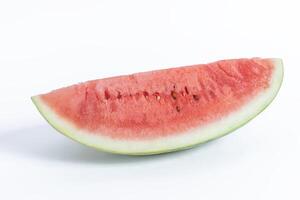 Fresh cut watermelon slice isolated on white background, close-up view. photo