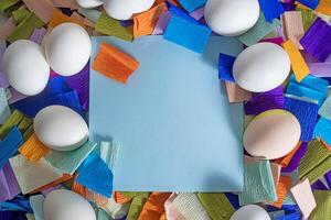 A colorful paper with an empty space surrounded by colorful paper photo
