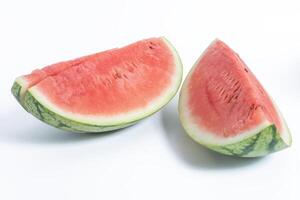 Fresh watermelon slices on a white background, close-up view. photo
