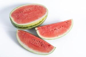 Freshly cut watermelon slices on a white background, top view photo