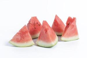 Closeup of juicy watermelon slices on a white background photo