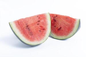 Fresh watermelon slices on white background, summer refreshments photo