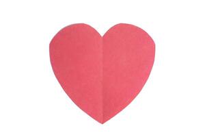 Valentine's Day concept. Red heart-shaped paper isolated on white background photo