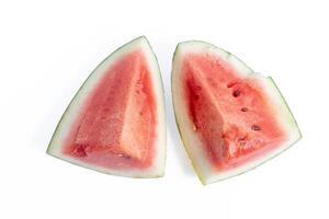Closeup of two juicy watermelon slices isolated on white background photo