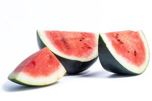 Fresh organic watermelon slices on a clean white background. Summer concept. photo