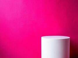 A white oval podium on a bright pink background. photo