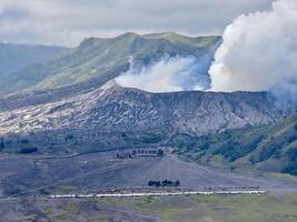 Scenic View of Mount Bromo with Rising Smoke photo