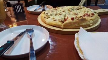 Freshly Baked Pizza Ready to Serve photo