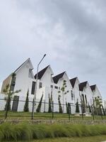 Modern White Houses with Triangular Roofs photo