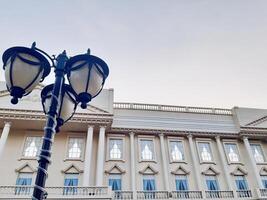 Neoclassical Building with Ornate Street Lamp. Batu Malang photo