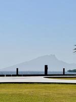 Serene Mountain Landscape with Clear Sky. Capture from Utama Raya Situbondo photo