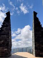 Scenic View from Stone Towers Against Blue Sky. Seruni Point Bromo photo