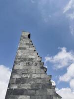 Stepped Stone Structure Against Blue Sky. Seruni Point Bromo photo