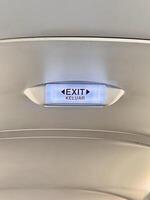 Illuminated Exit Sign in Vehicle photo