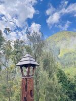 Rustic Lantern Post with Mountain View. Bromo National Park, Indonesia photo