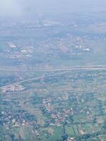 Aerial View of Rural Landscape with Fields and Roads photo