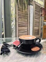 Cozy Cafe Scene with Coffee and Cookie photo