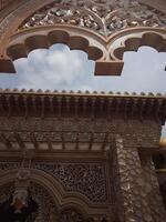 Beautiful Gate Art Carving of the great mosque photography landscape with sky background. Bottom view photo