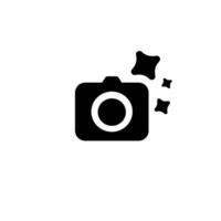 An icon displaying a black and white camera surrounded by stars vector