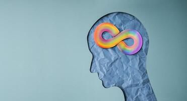 World Autism Day Concepts. represent by a Rainbow Infinity Symbol on the Brain. Autism Awareness Day. Neurodiversity, Inclusivity, and Acceptance. photo