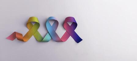 World Autism Day Concepts. Rainbow Color Ribbon on White background. Autism Awareness Day. Neurodiversity, Inclusivity, and Acceptance. Top View photo