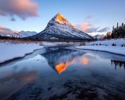 explore natures majestic masterpiece, crystalline waters of bow river, flowing through giants of rocky mountains in canmore, alberta, canada - captivating landscape painted by mother nature photo