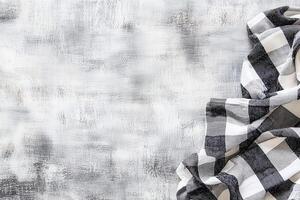 Rustic Wooden Background with Black and White Checkered Tablecloth for Display and Decor photo