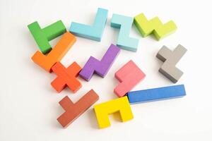 Logical thinking and problem solving problem solution creative business, wooden puzzle geometric photo