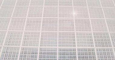 A small lattice covering the window of a modern building. video
