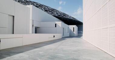Minimalistic white building with an openwork dome. Abstract construction, modern art video