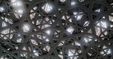 Close-up of the openwork dome of the Louvre Dubai. The camera is spinning, the pattern resembles a kaleidoscope video