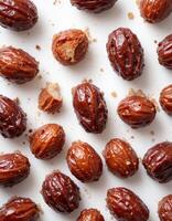 Sweet Glazed Nuts On White Background photo