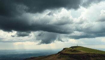 Stormy Clouds Over Mountaintop Landscape With City View photo
