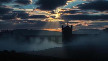 Dramatic Sunset Over A Bridge And Stone Buildings With Atmospheric Fog In Evening photo