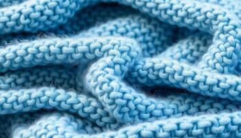 Close Up View Of Blue Knitted Fabric Texture With Detailing On Stitches And Yarn Colors And Patterned Stitches Design For Apparel And Textiles Use Case And Texture Fabric photo