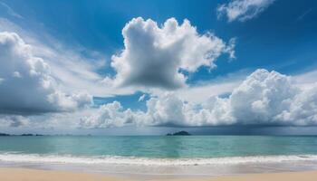 Bright Blue Sky Over Turquoise Ocean With White Clouds And Sandy Beach photo