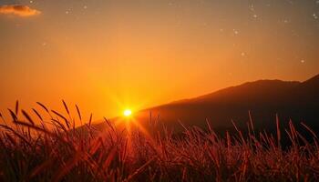 Sunrise Over Mountains And Grassy Field photo