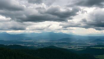 Panoramic View of Mountain Valley Under a Cloudy Sky photo