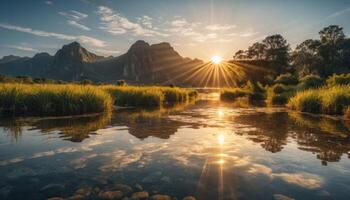 Golden Sunrise Over Calm Lake with Mountain Reflection photo